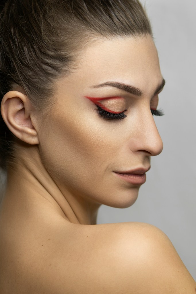 Model with bold geometric eyeliner.