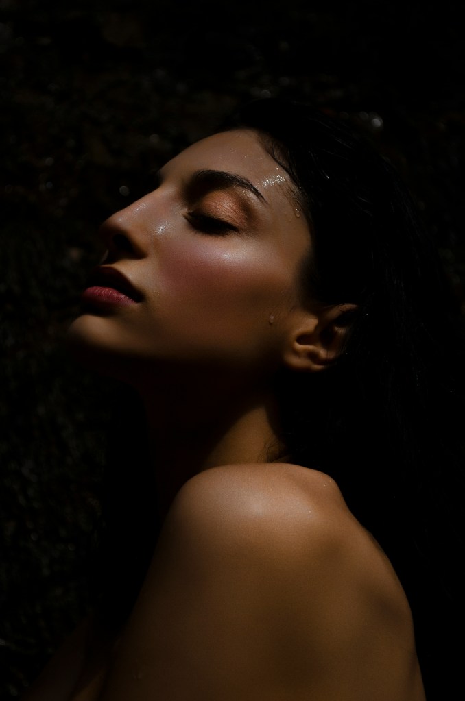 Soft strawberry blush across cheeks and nose.