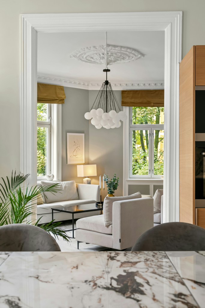 Light-filled Scandinavian interior featuring warm minimalism, clean lines, and cozy winter styling.